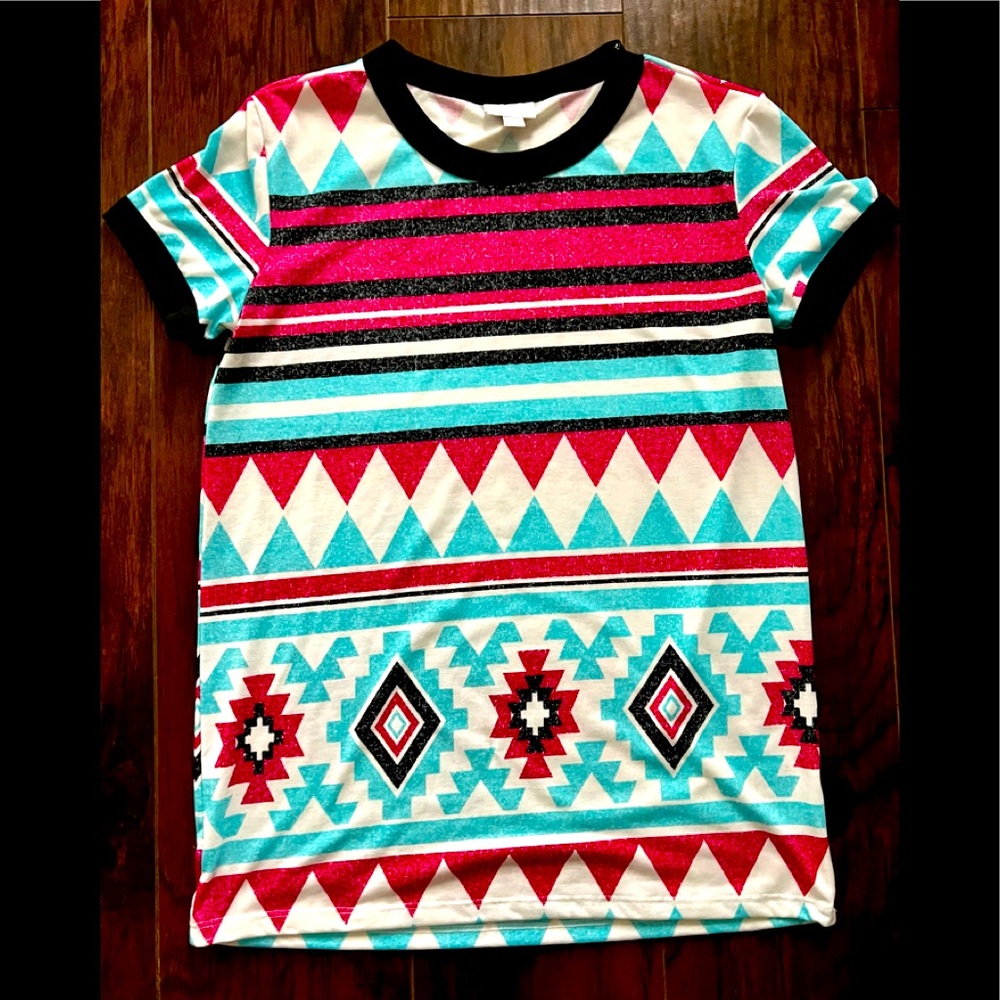 Size Small LuLaRoe Aztec print tee. Only worn once. Vibrant colors.